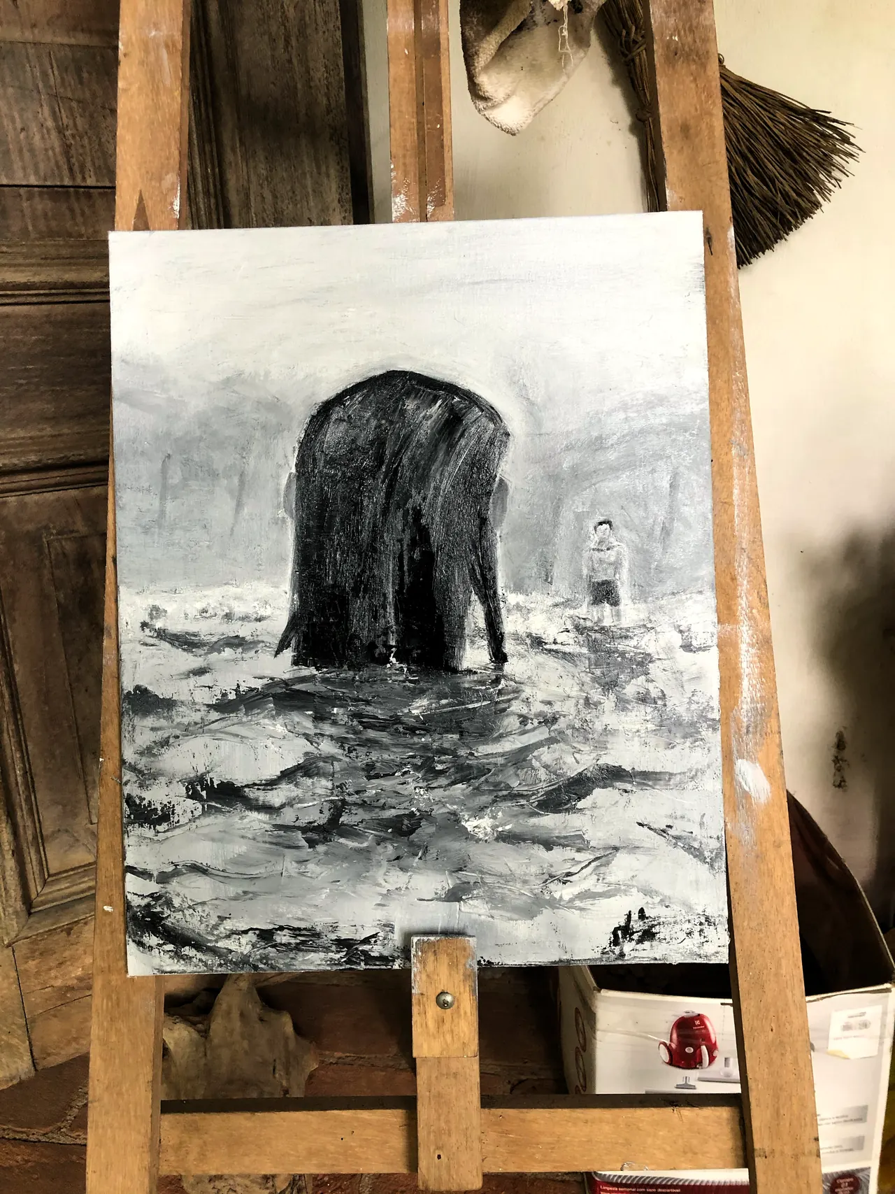 pintura em andamento no cavalete